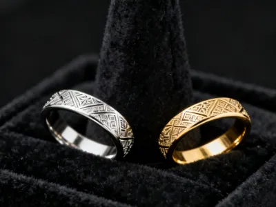 Laser engraved silver and gold rings